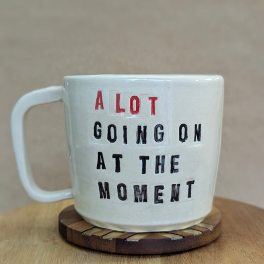 Mug: A Lot Going On At The Moment